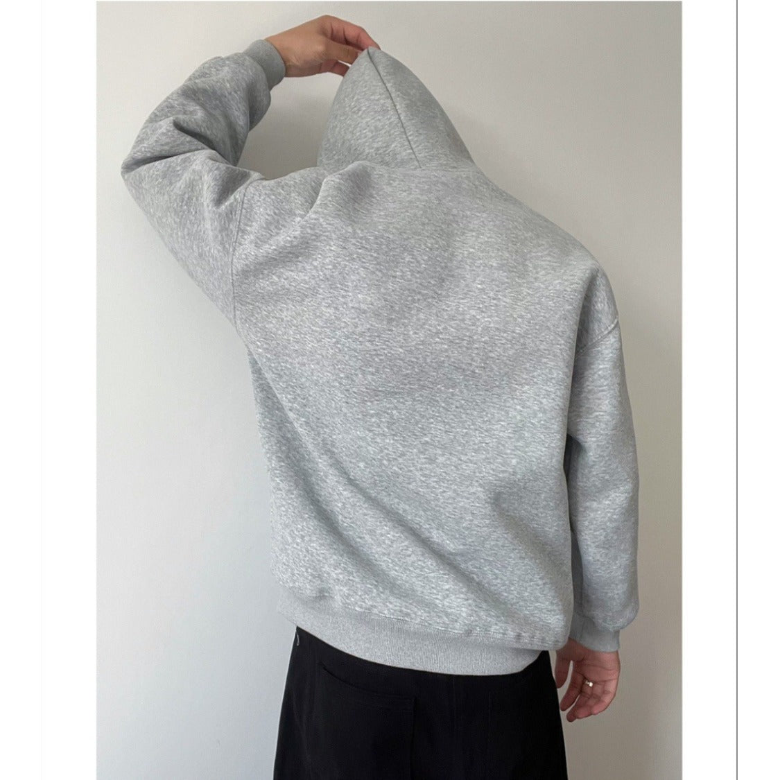 Pull à capuche de couleur unie