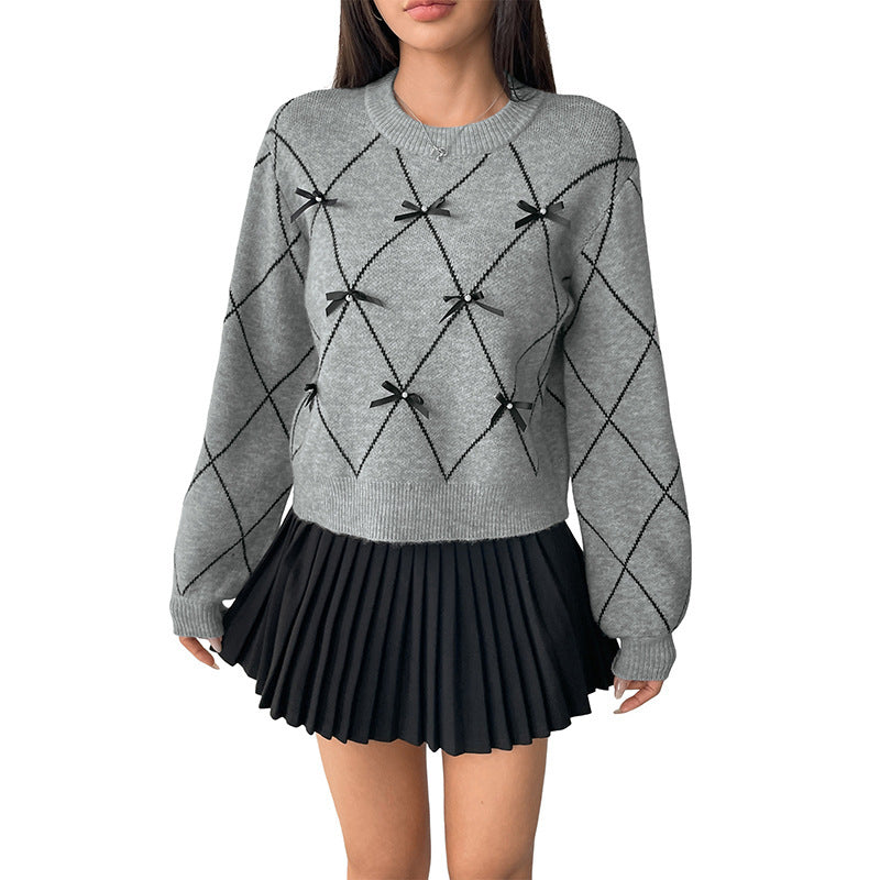 Pull tricoté avec nœud décoratif