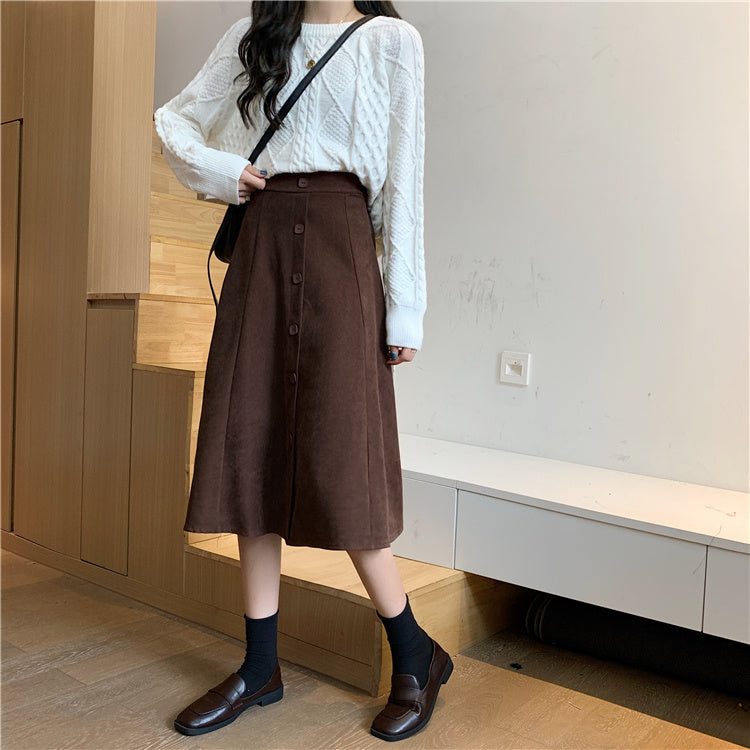 Jupe trapèze mi-longue taille haute