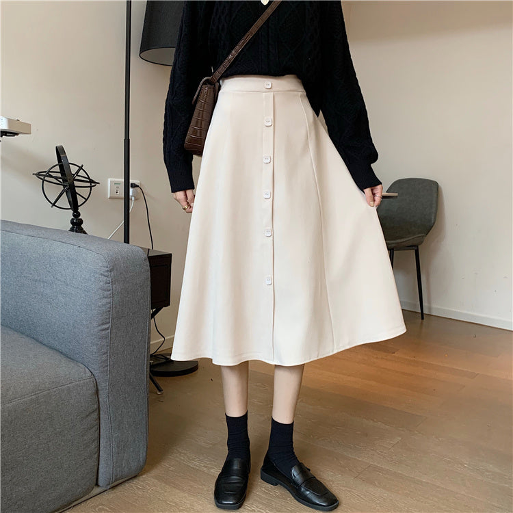 Jupe trapèze mi-longue taille haute