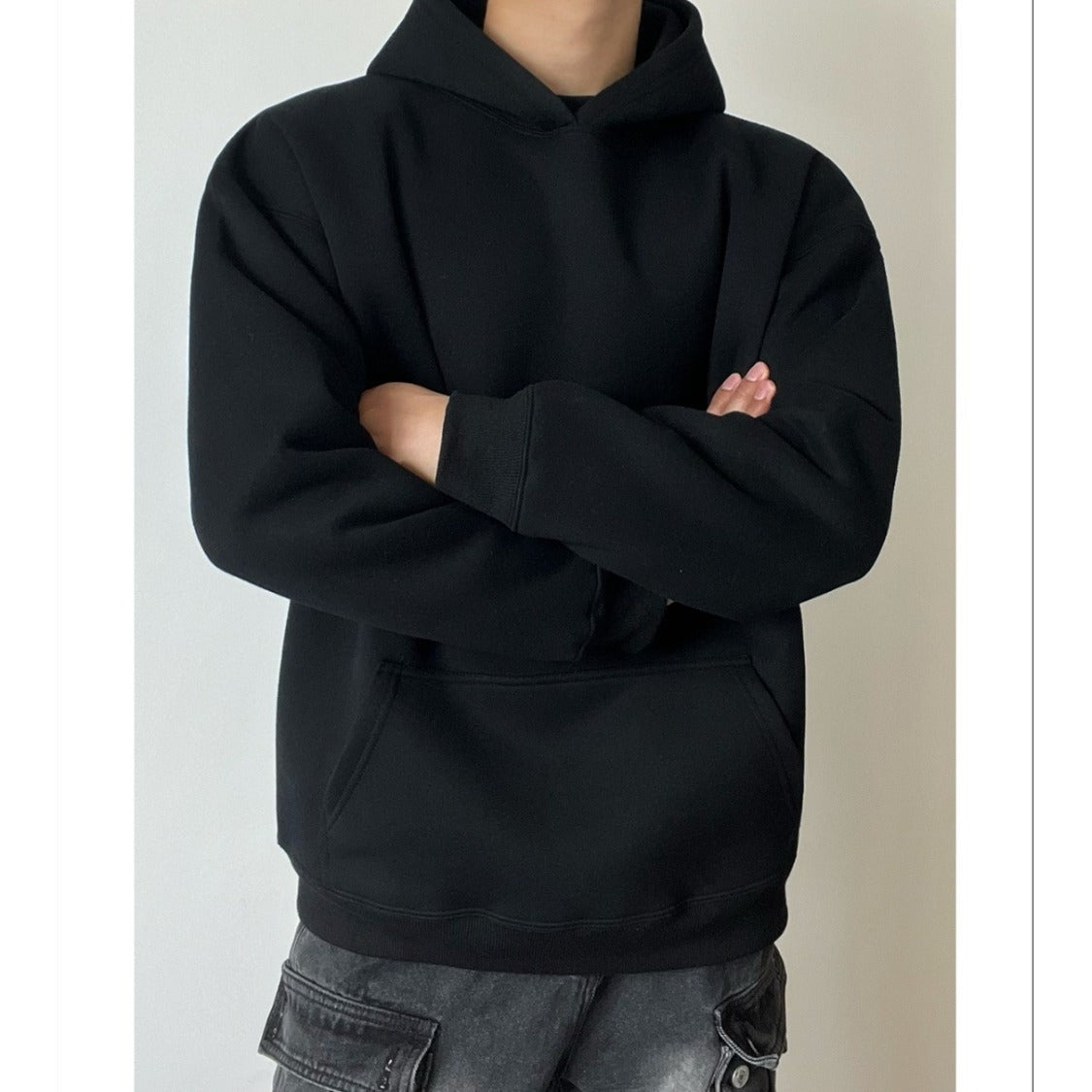 Pull à capuche de couleur unie