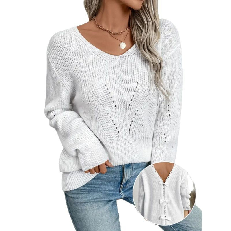 Pull élégant à col rond, découpes en dentelle, coutures et nœud dans le dos