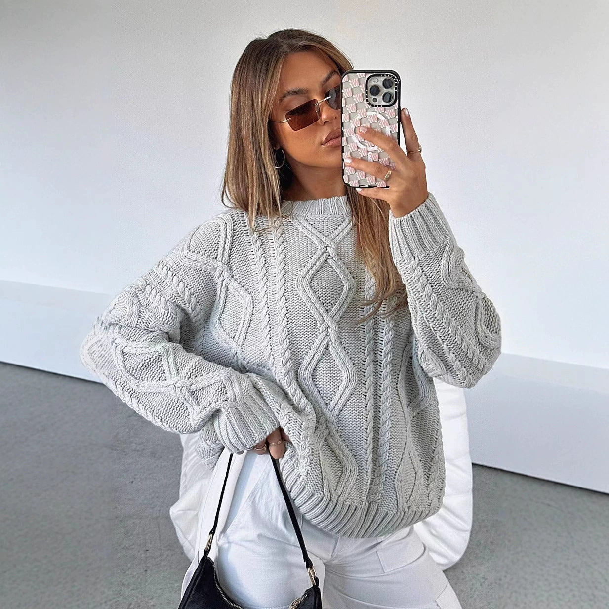 Pull torsadé ample