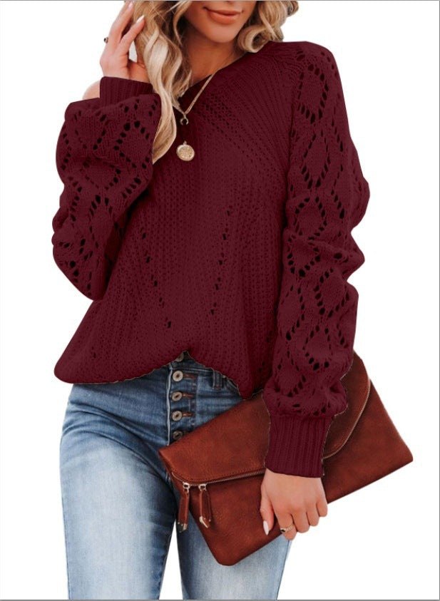 Pull col rond uni à motif creux