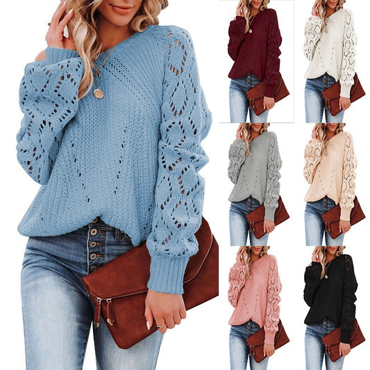Pull col rond uni à motif creux