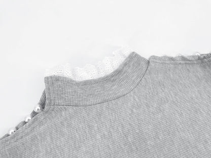 Pull à col roulé en dentelle avec perles creuses
