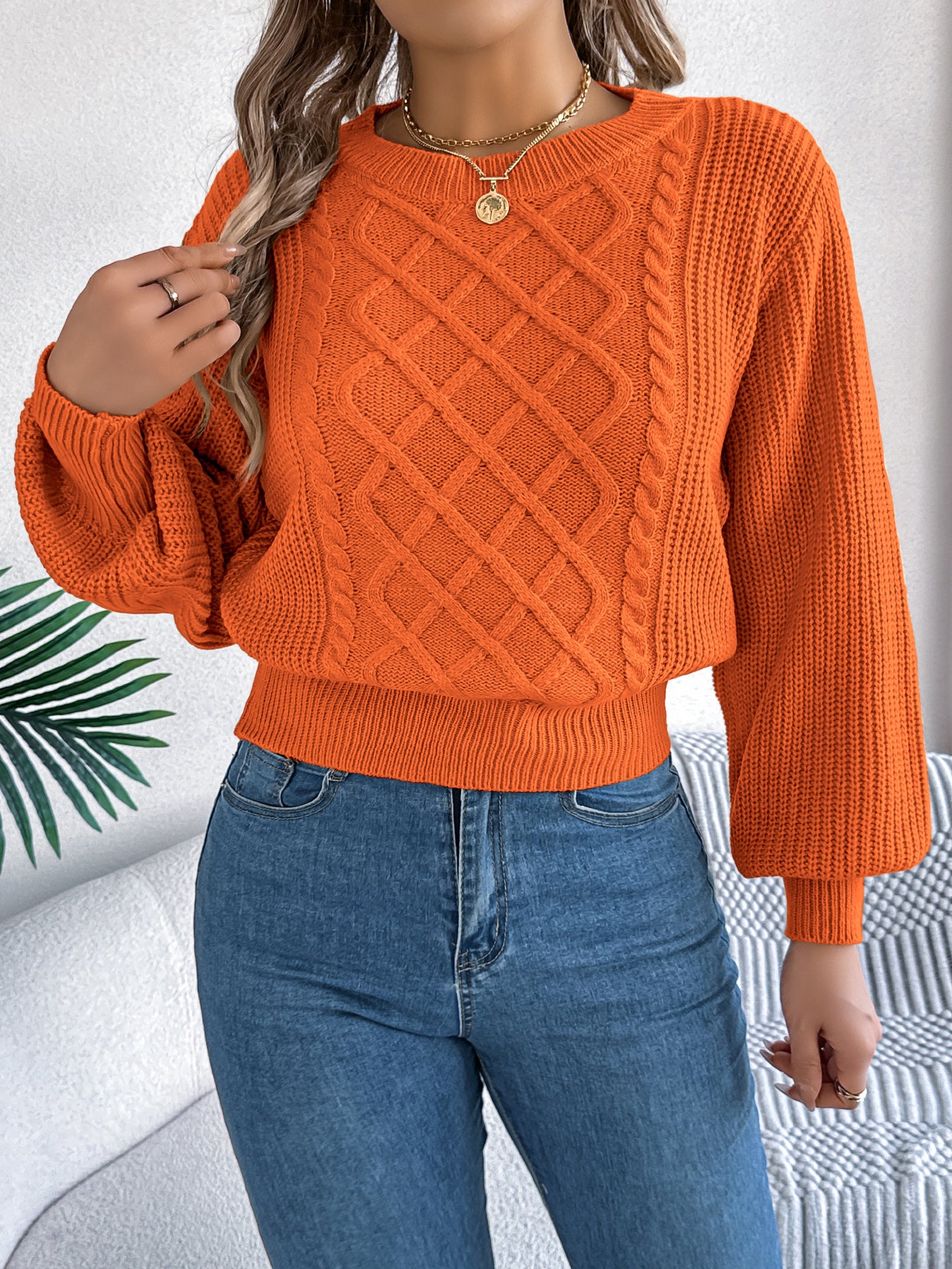 Pull à manches lanternes en maille torsadée unie, taille cintrée