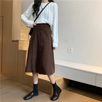 Jupe trapèze mi-longue taille haute