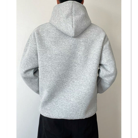 Pull à capuche de couleur unie